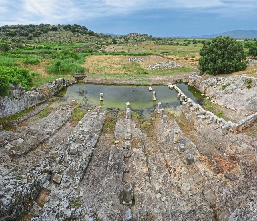 Ship_sheds_at_Oiniades,_Greece._This_large_rectangular_complex_was_carved_out_of_the_bedrock_and_created_for_the_constru