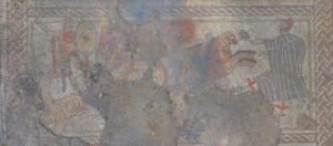 Ausschnitt des Mosaiks zeigt Achilles, wie er den Körper Hektors hinter seinem Streitwagen herzieht,